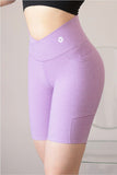 SHORT LILA CON BOLSAS LATERALES